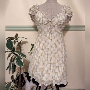 UO Milkmaid Bardot floral smocked mini dress puff sleeve